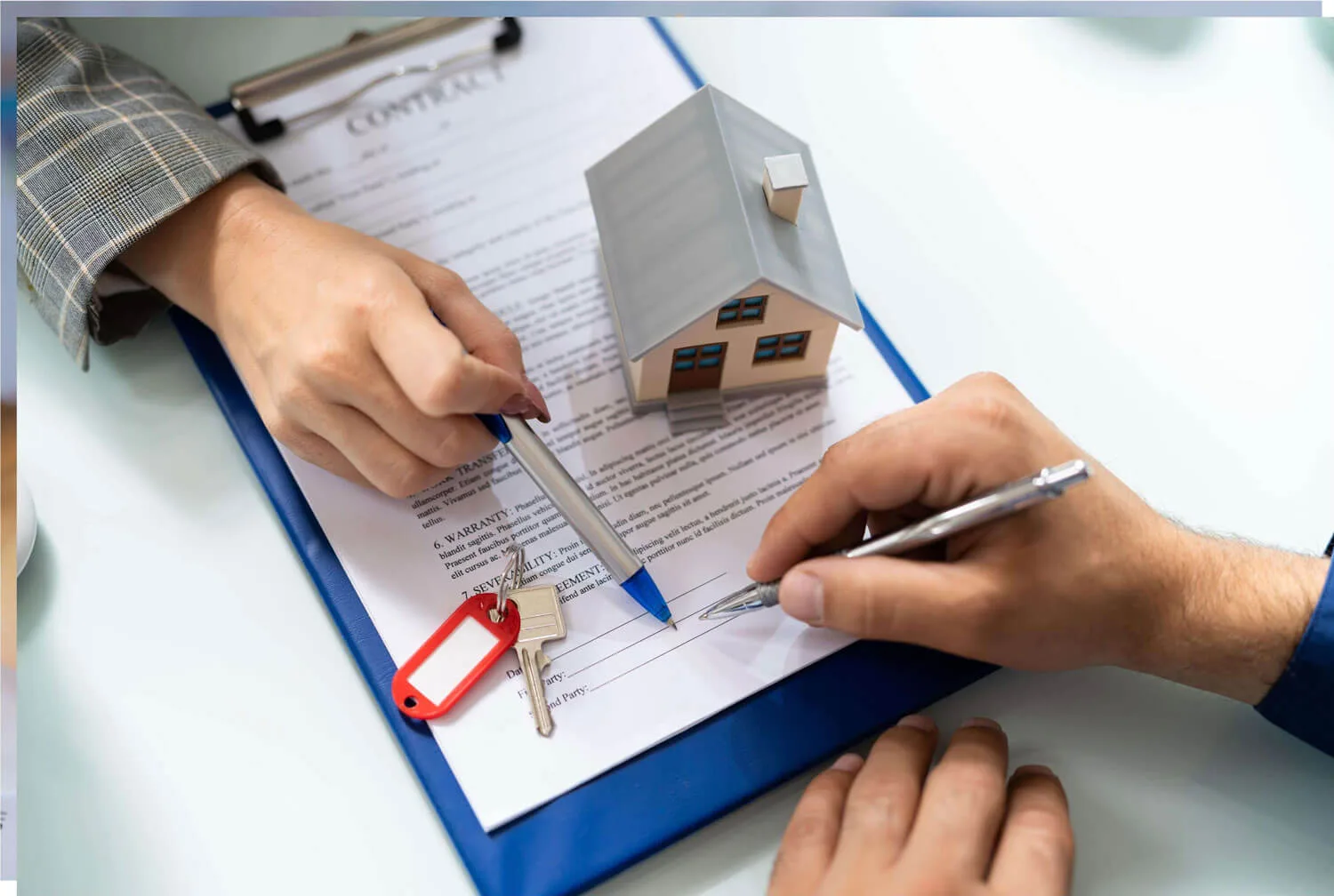 A landlord reviewing a lease agreement with a tenant, ensuring clear terms and legal protection for a rental property in Houston.