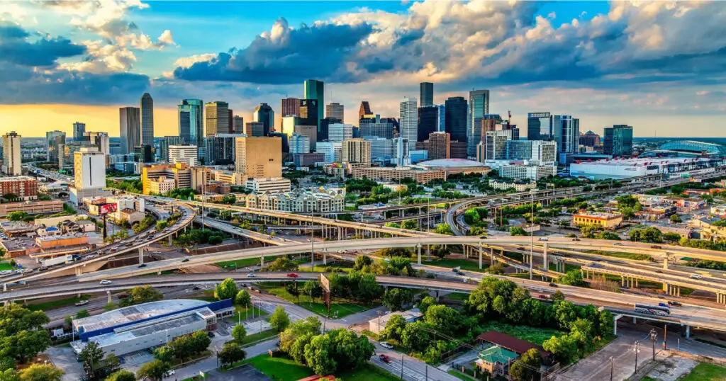 Aerial view of modern homes and skyline representing current real estate trends in Houston, Texas